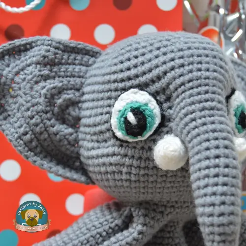 Close up of ellies face the crochet elephant lovey pattern